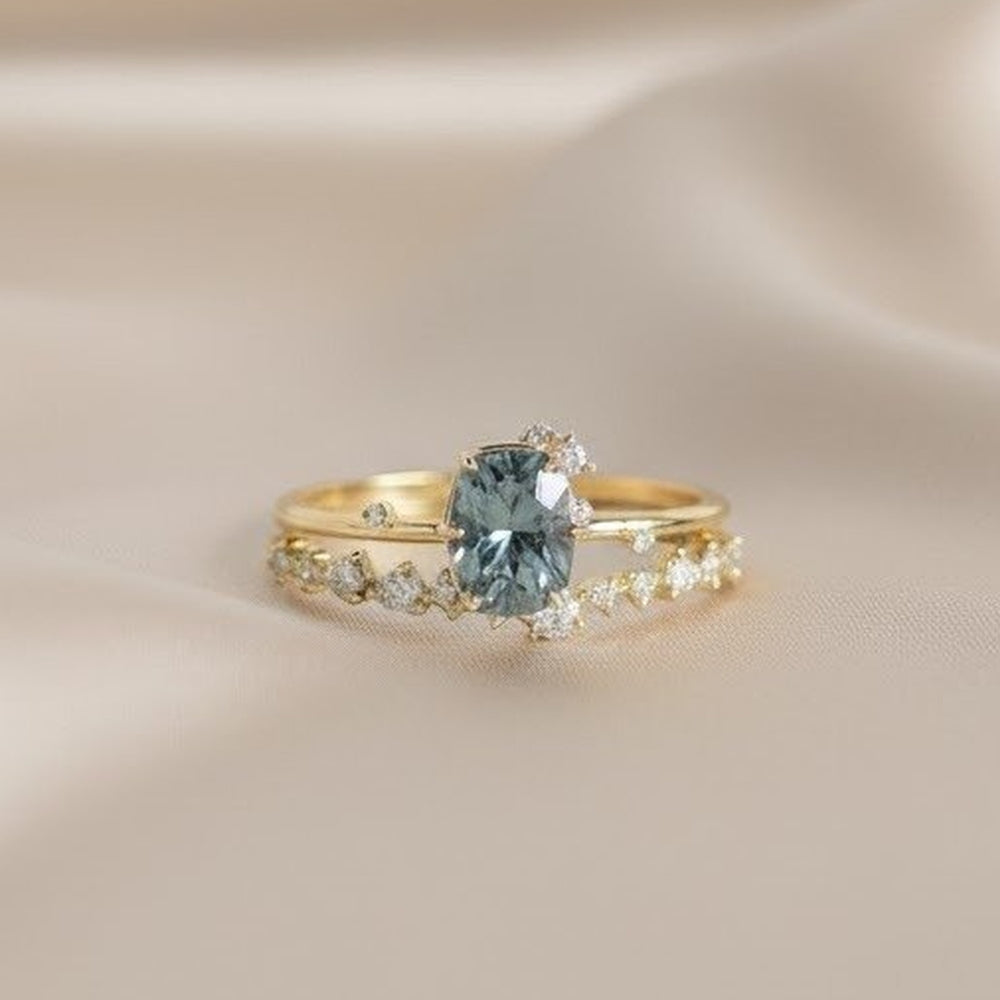 Stella di Marea – Golden ring with blue crystal and zirconia