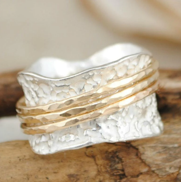 Timeless Twirl: Elegant Gold & Silver Spinner Ring